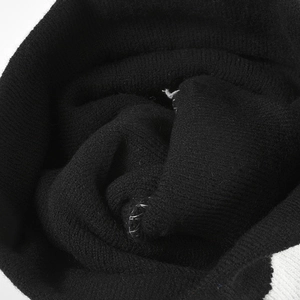 Double-layered black ribbed knit beanie featuring warm jacquard pattern for winter comfort