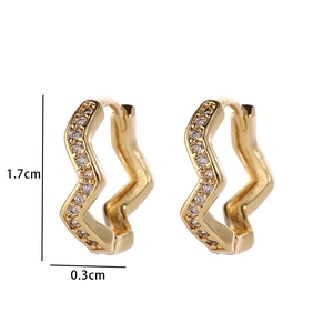 Detail showing 1.7cm height and 0.3cm width of gold plated wave zircon earrings
