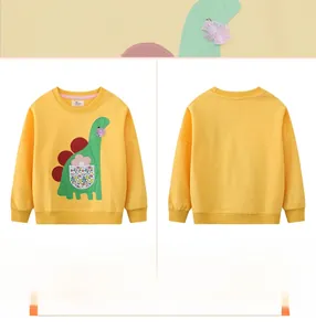 Detail of yellow kids sweatshirt with green dinosaur applique and floral pocket
