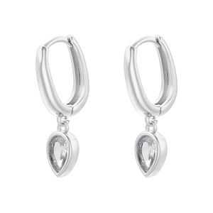 Close-up of silver drop earrings with pear-cut cubic zirconia in U-shaped hoop
