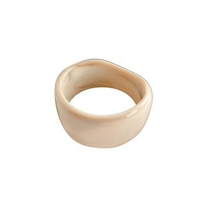 Minimalist cream white chunky resin ring with subtle marble texture in a smooth round shape
