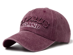Detail of CYPRUS ISLAND embroidery on vintage distressed burgundy washed cotton baseball cap