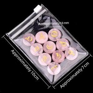 Pink crystal planets symbols set with 9 engraved stones in 10x7cm packaging bag