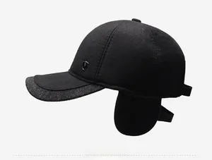 Detailed side view of winter baseball cap featuring ear flaps and herringbone texture