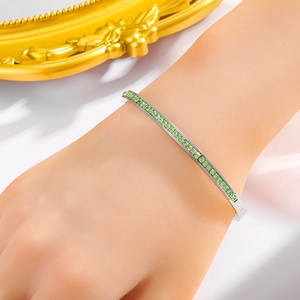 Silver stainless steel bangle with emerald green zircon channel setting for women