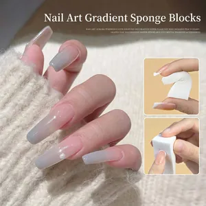 Nail art sponge wedges for DIY gradient manicure effects on long blue-grey nails