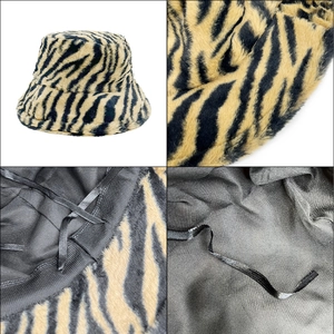 Plush tiger pattern bucket hat with warm faux fur texture and adjustable inner lining