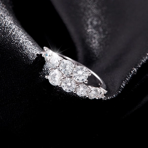 Elegant S925 sterling silver band ring with sparkling round cubic zirconia on black silk