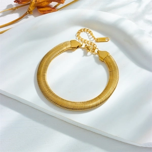 Classic gold flat snake chain bracelet in stainless steel with elegant adjustable extender