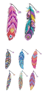 Detailed macro view of 8 different colorful diamond painting feather bookmarks with crystal charms