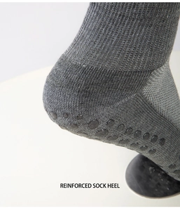 Macro shot of gray diabetic sock with reinforced heel and anti-slip particles