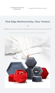 Detail of red and blue hexagonal velvet jewelry boxes on stone props for rings and necklaces