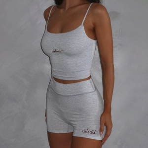 Women's chic grey two-piece lounge set with square neck crop top and slim fit shorts