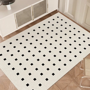 Minimalist French PVC doormat with black checkered pattern on beige woven texture