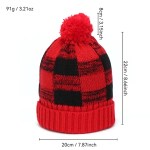 Winter red buffalo plaid knit beanie for women with cozy pom-pom and ribbed cuff detail