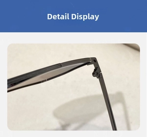 Detail view of high-precision metal hinges and gunmetal temples on driving sunglasses