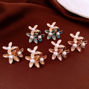 Detailed set of 18K gold plated flower stud earrings with enamel petals and pearls