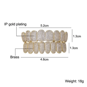 Gold iced out hip hop grillz set with cubic zirconia stones and size measurements