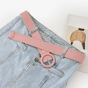 Pink woven belt with round buckle styled on denim shorts for fashion decoration