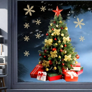 Macro detail of golden snowflake and Christmas tree static window decals on glass surface