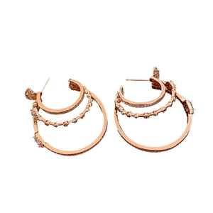 Three-layer rose gold hoop earrings with sparkling crystal pavé on a clean white background