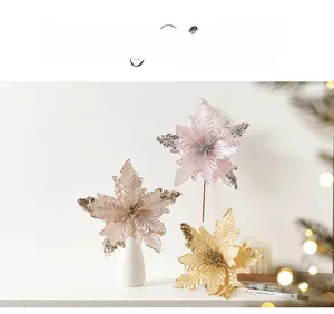 Close-up of 25cm artificial Christmas flowers in champagne and pink with sequined petals