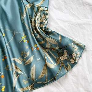 Elegant grey-blue floral satin bathrobe with white flowers and orange berry patterns