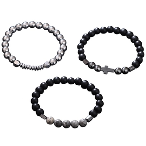 Three-piece stretch bracelet set with cross pendant, matte black and marble stone beads