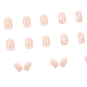 Short square press-on nails with white camellia flowers and French tips in pink
