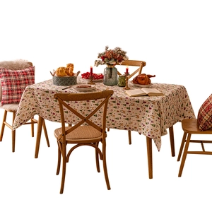Christmas themed linen table cloth with gingerbread man patterns for holiday decor