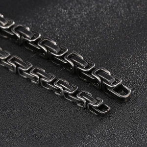 Macro shot of Byzantine style stainless steel chain with vintage silver and black finish