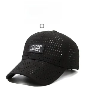 Detail of breathable diamond mesh fabric and fashion sport label on black baseball cap