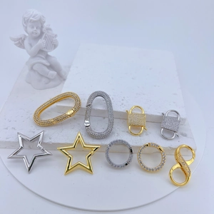 Detailed view of micro-paved zircon jewelry clasps in star and oval shapes for DIY