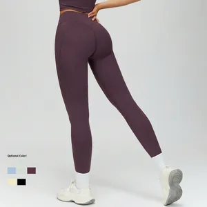 High-waisted plum yoga leggings with body-sculpting fit and seamless gym style