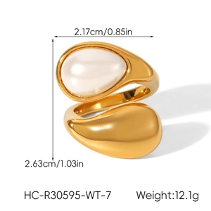 Detail showing dimensions of golden open ring with water drop design and pearl inlay