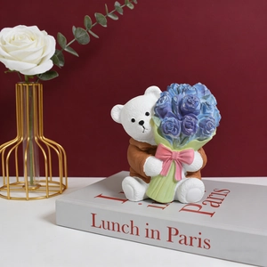DIY bear candle mold featuring a cute resin bear holding a blue rose bouquet