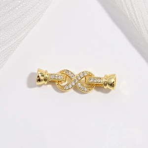 Infinity figure-eight jewelry clasp in 18K gold plated copper with cubic zirconia stones