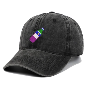 Close-up of colorful bottle embroidery on black washed denim baseball cap surface