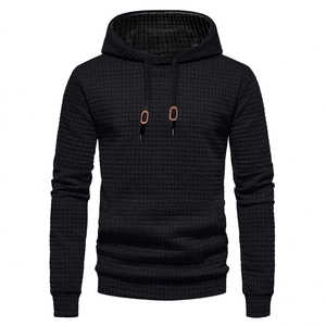 Men's black waffle knit hoodie with drawstring hood and classic long sleeve design