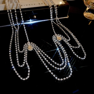 Detailed macro of layered rhinestone fringe and large pear-cut crystal teardrops