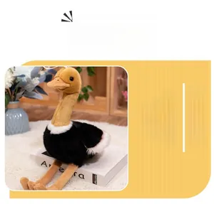 Realistic small ostrich plush toy with soft black and white fur in home setting