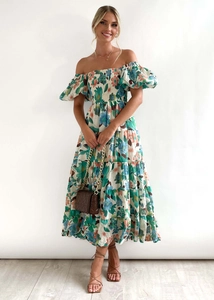 Detail view of floral off-shoulder midi dress featuring puff sleeves and tiered skirt hem