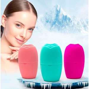 Silicone rose ice face roller for skin cooling and massage in pink, cyan, and magenta
