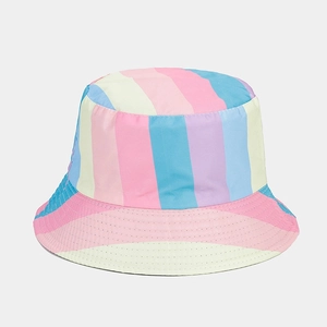 Close-up of vibrant rainbow striped bucket hat showing detailed stitching and fabric texture