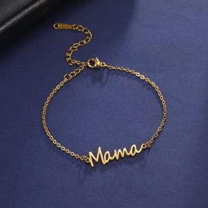 Close-up of gold Mama letter pendant on minimalist stainless steel chain with lobster clasp