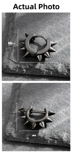 Detail view of black punk spike earrings with tile display and precise dimensions