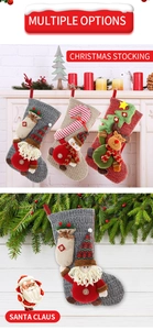 Knitted Christmas stockings with Santa, snowman and reindeer on a festive fireplace mantel