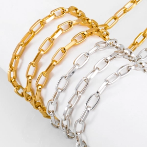 Glossy gold and silver aluminum O-link crossbody chain straps on white background