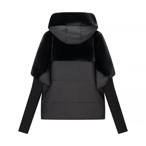 Rear view of black jacket with faux fur upper and quilted hem and ribbed knit sleeves