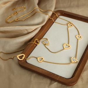 18k gold plated stainless steel sweater necklace with hollow and zircon heart pendants